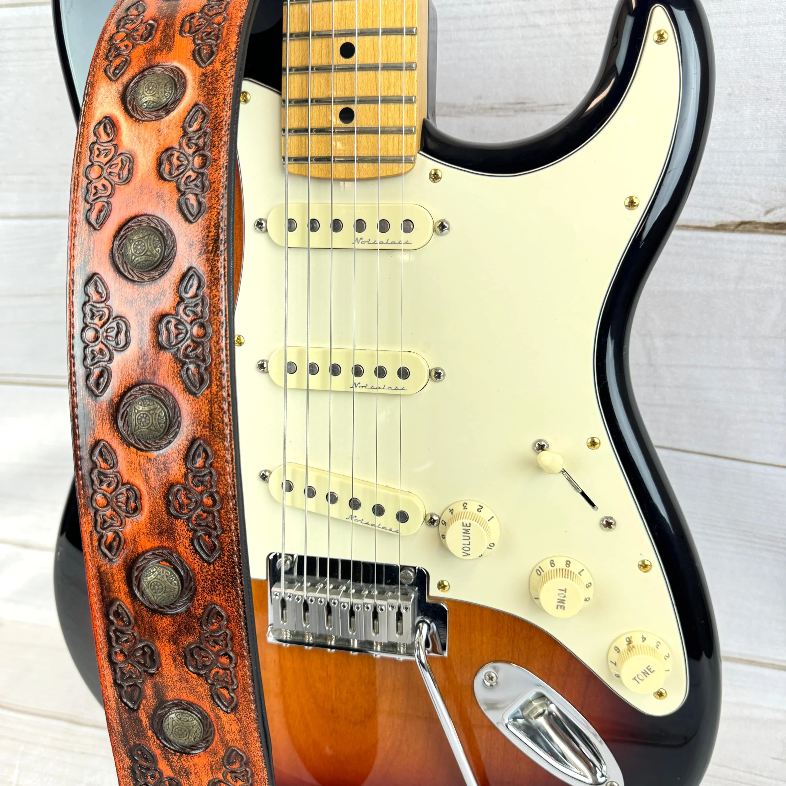 Walker & Williams GE-202 Antique Amber Tan Padded Guitar Strap with Brass Coin Studs, Brass Buckle, And Celtic Tooling For Acoustic, Electric, And Bass Guitars - Image 6