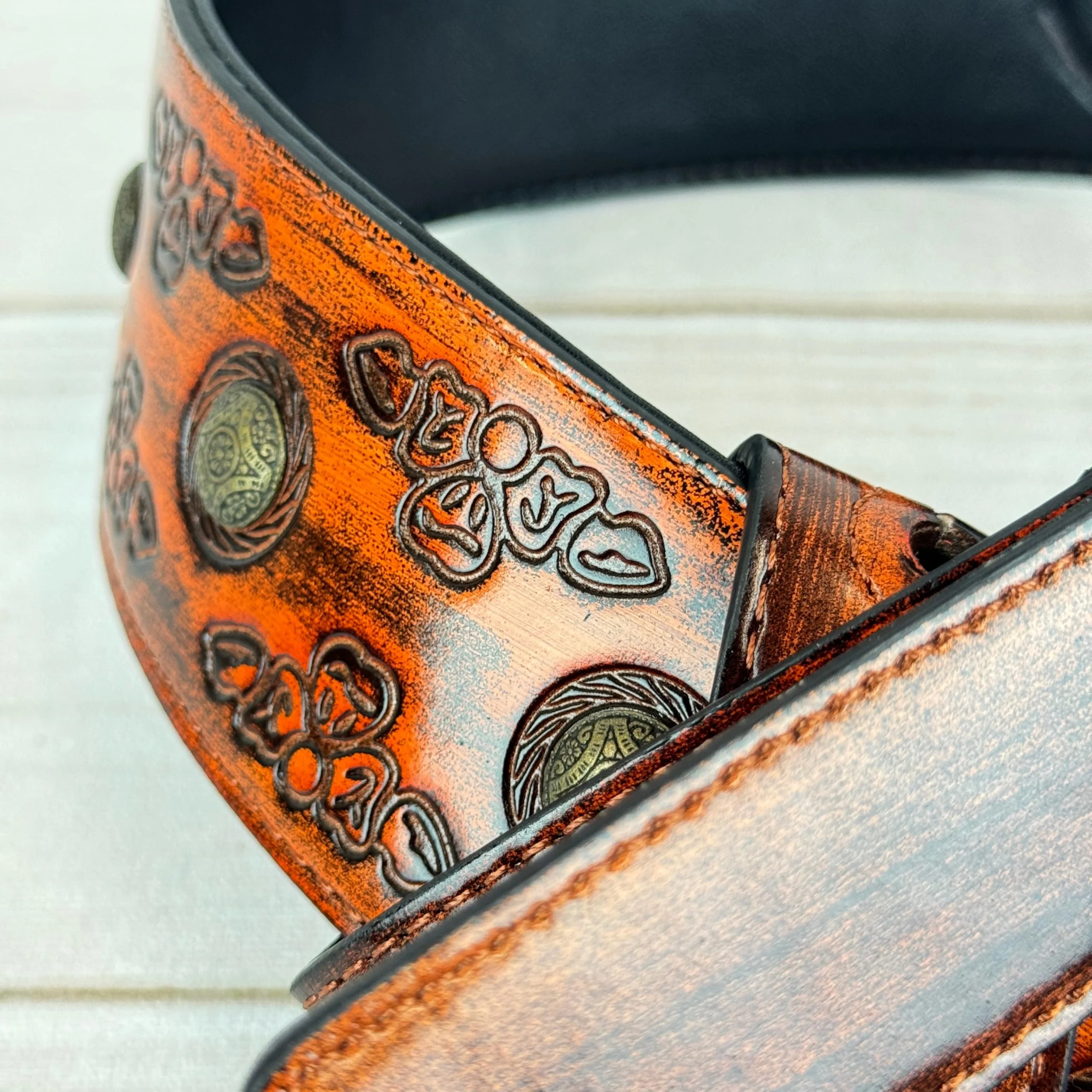 Walker & Williams GE-202 Antique Amber Tan Padded Guitar Strap with Brass Coin Studs, Brass Buckle, And Celtic Tooling For Acoustic, Electric, And Bass Guitars - Image 7