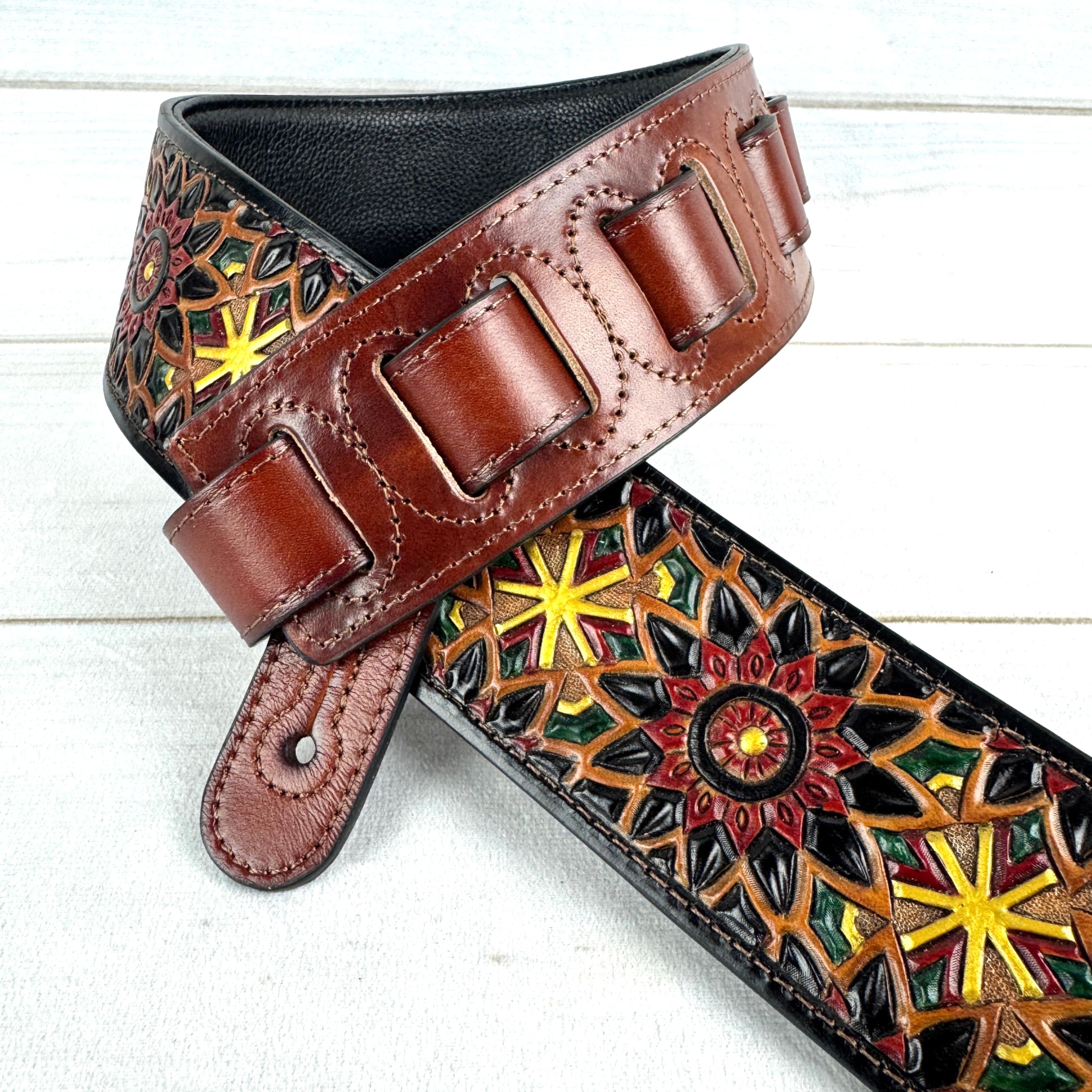 Walker & Williams LIH-2 Black And Brown Hand Carved Premium Leather Guitar Strap With Gold Earth Zodiac Star Design And Premium Padded Back For Acoustic, Electric, And Bass Guitars - Image 3