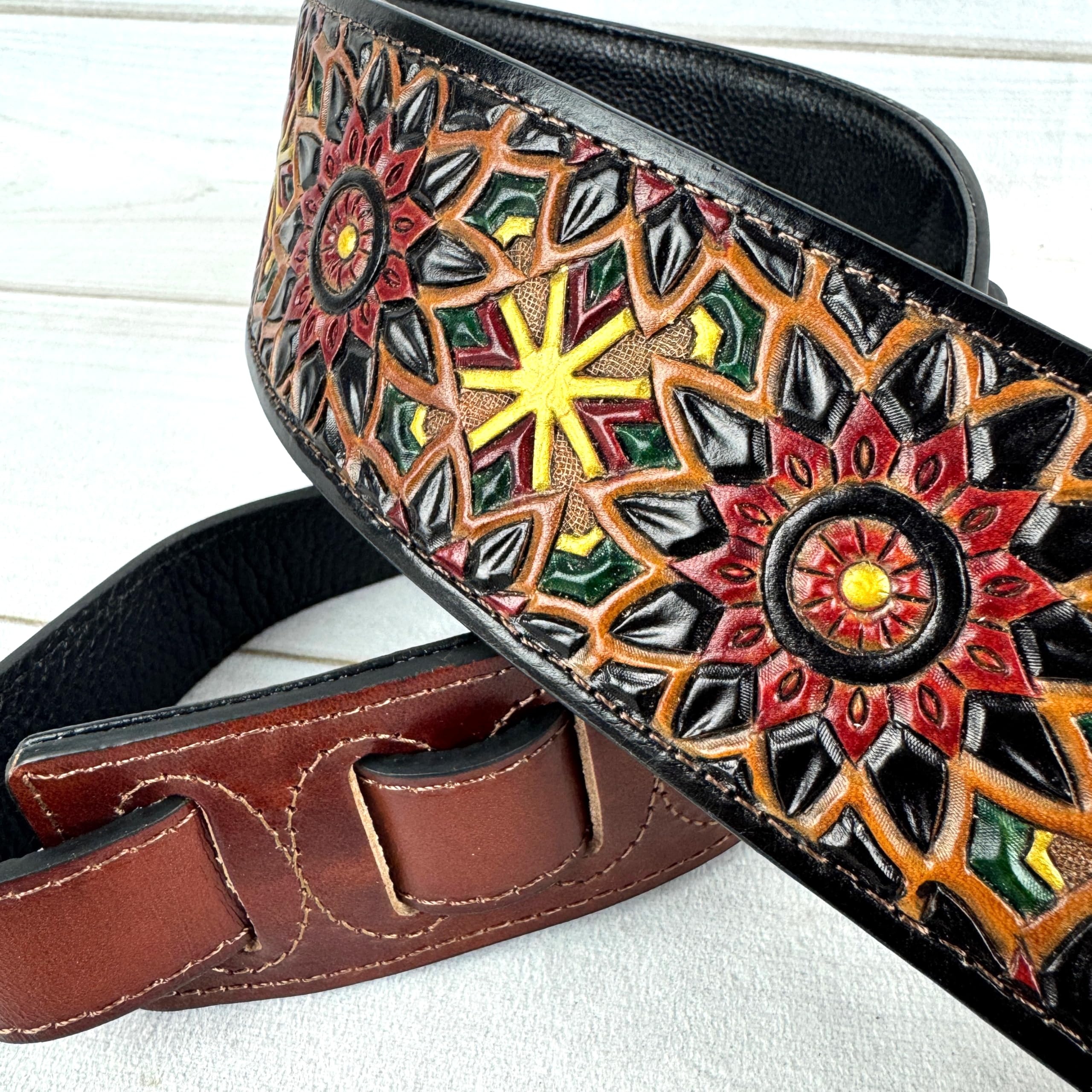 Walker & Williams LIH-2 Black And Brown Hand Carved Premium Leather Guitar Strap With Gold Earth Zodiac Star Design And Premium Padded Back For Acoustic, Electric, And Bass Guitars - Image 4
