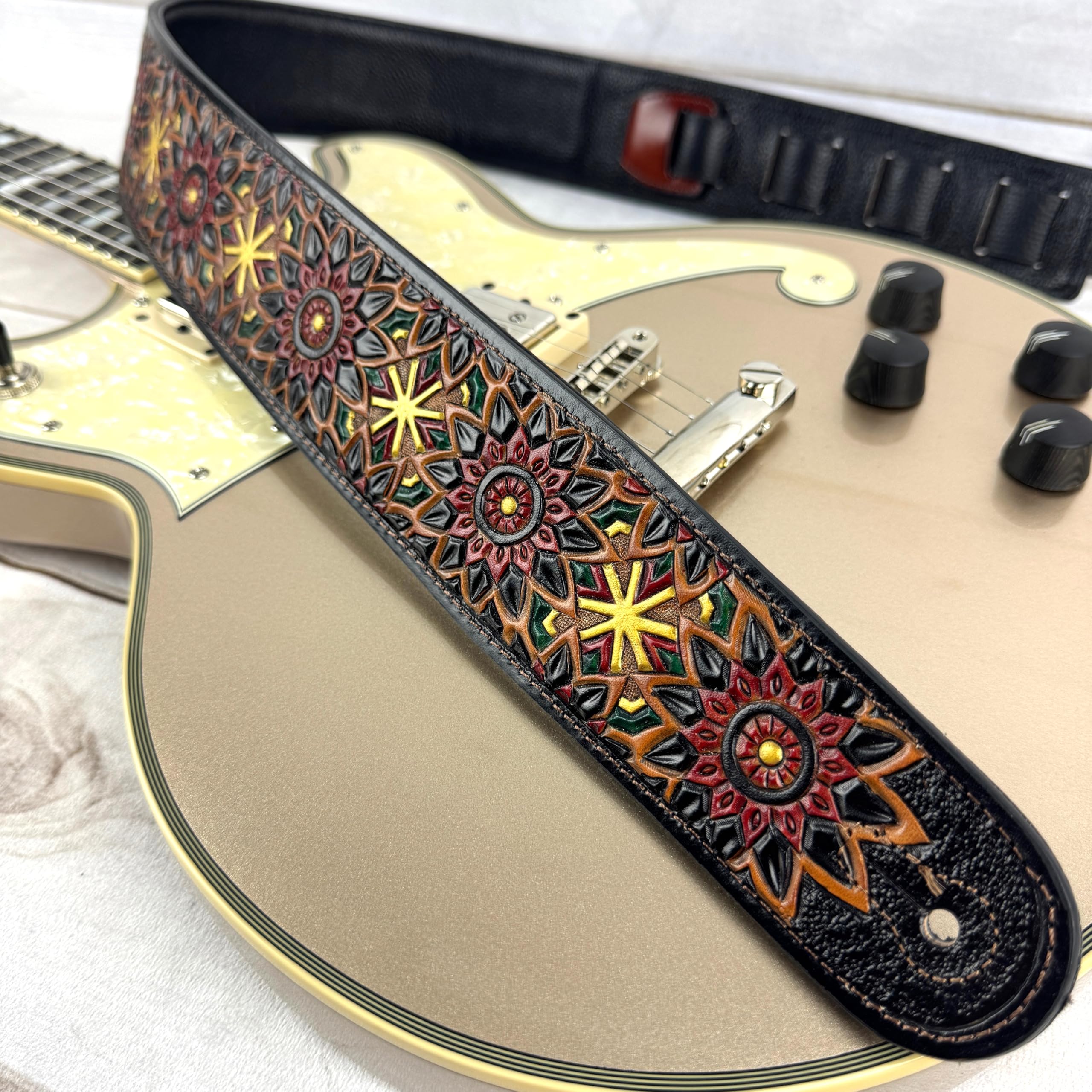 Walker & Williams LIH-2 Black And Brown Hand Carved Premium Leather Guitar Strap With Gold Earth Zodiac Star Design And Premium Padded Back For Acoustic, Electric, And Bass Guitars - Image 6
