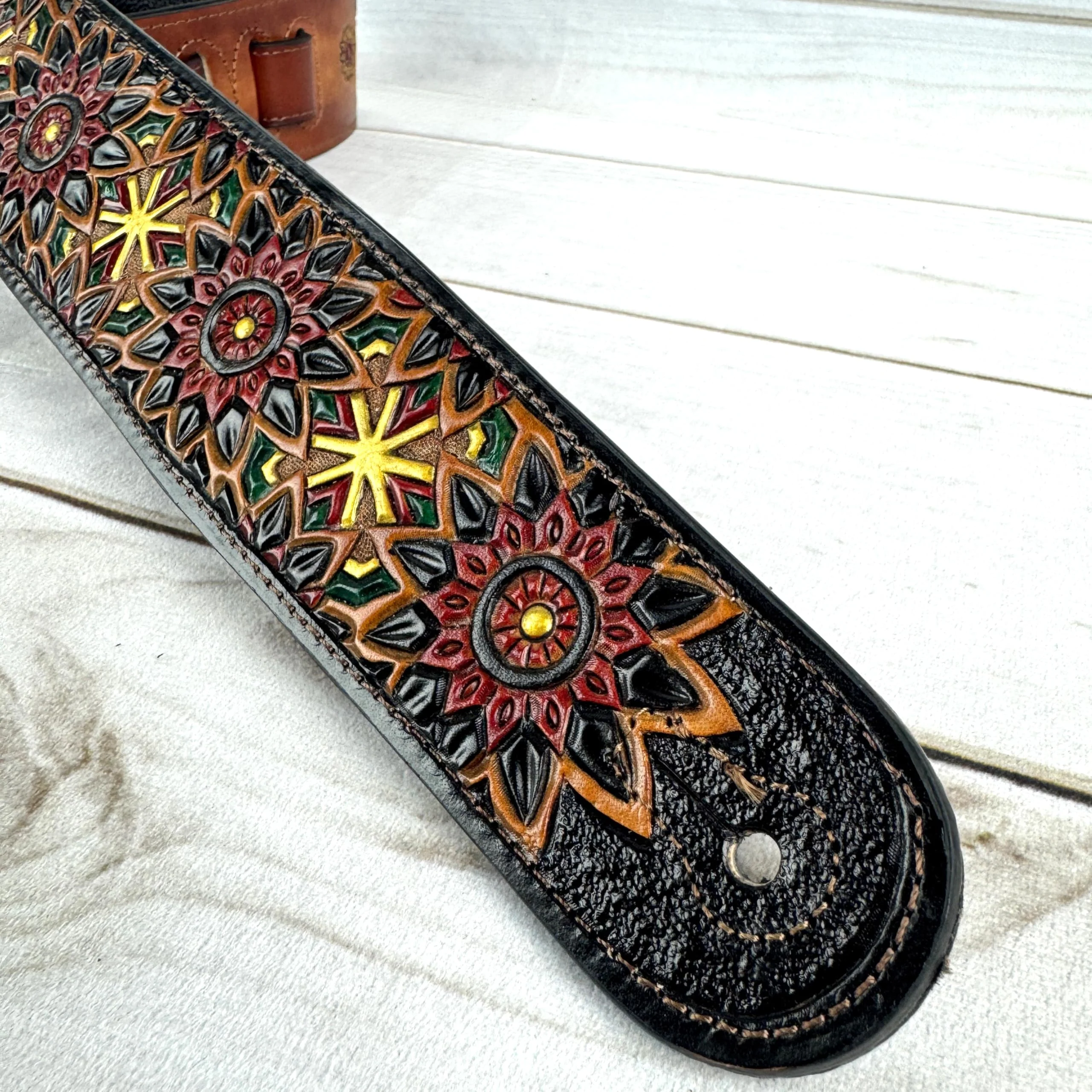 Walker & Williams LIH-2 Black And Brown Hand Carved Premium Leather Guitar Strap With Gold Earth Zodiac Star Design And Premium Padded Back For Acoustic, Electric, And Bass Guitars - Image 7